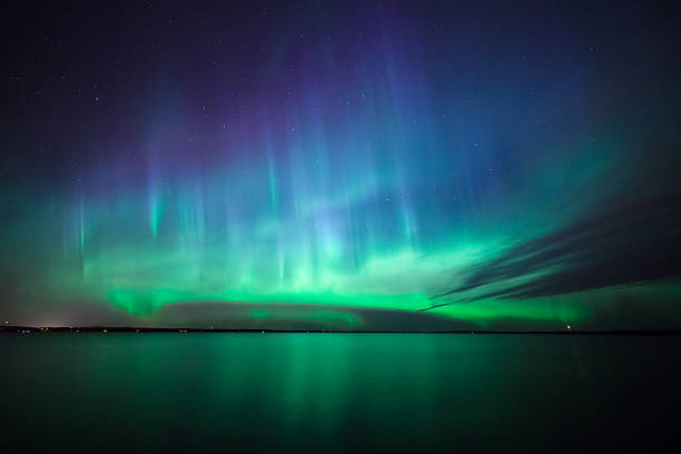 istock Northern lights over lake in finland 494093714