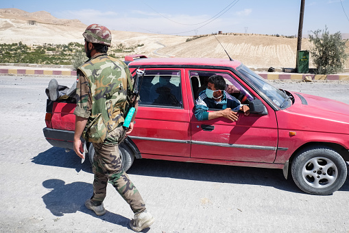 Ma'loula, Syria - September 19, 2013: The car with the body of a murdered man stopped at the checkpoint of the Syrian national army on the outskirts of the city Ma'loula.