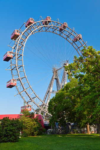 Prater - a historic ferris wheel with red cabins in Vienna, Austria