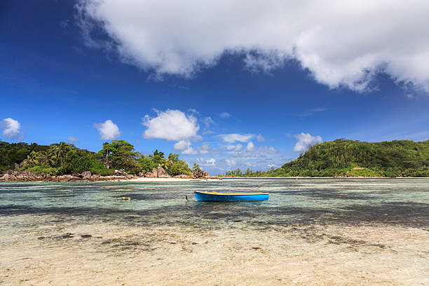 istock Mahe island beach with lonely boat in Seychelles 494096345