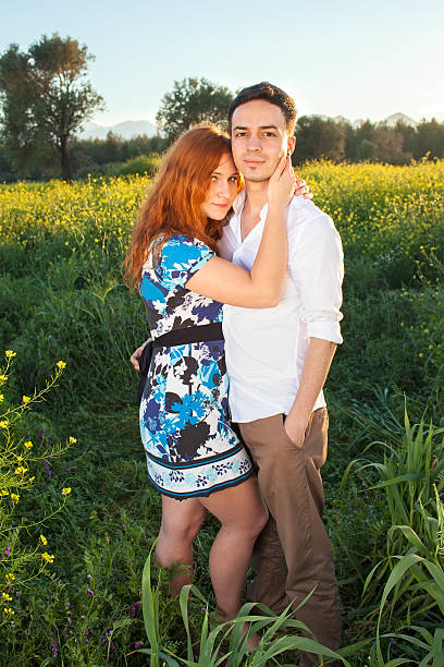 Affectionate young couple in the countryside.