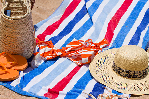 istock towel with swimming assesories 494097349