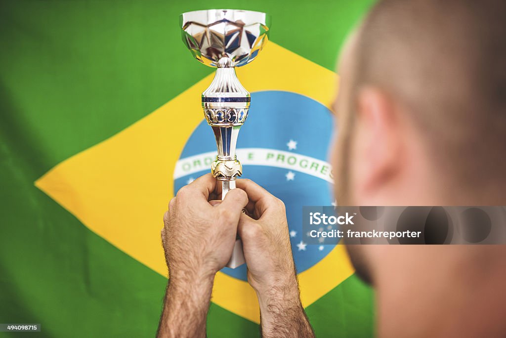 brazilian soccer player holding the trophy http://blogtoscano.altervista.org/tro.jpg  30-39 Years Stock Photo