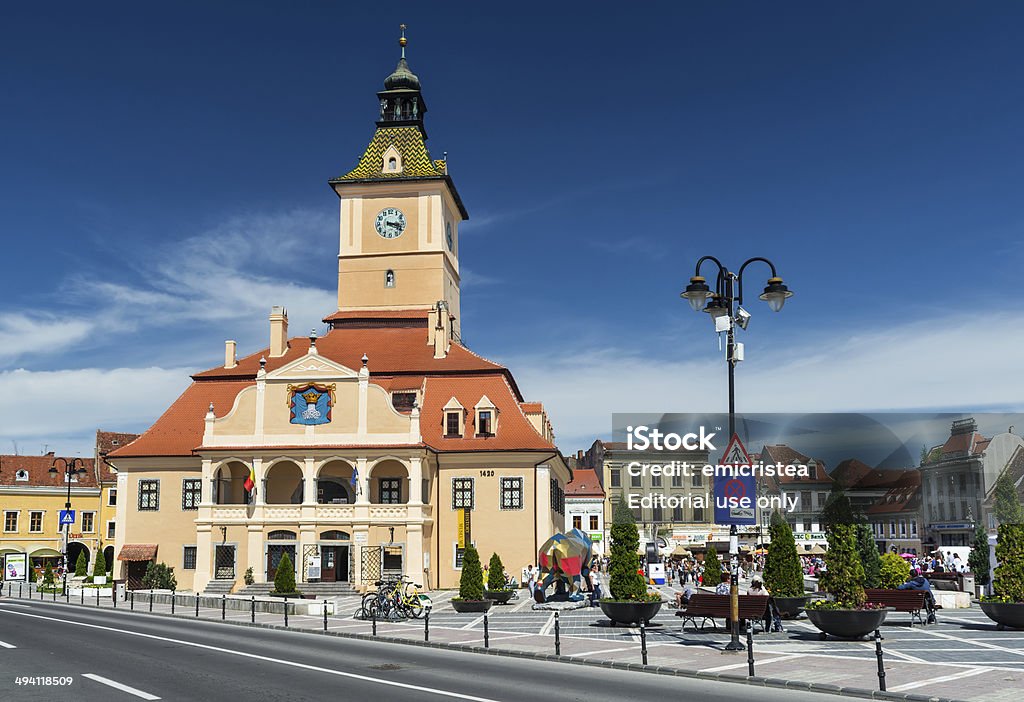 Council House, Brasov, Romania Brasov, Romania - May 11, 2014: Image with medieval downtown and Council House (History Museum), taken on 11th May 2014, touristic city of Transylvania, Romania. Architecture Stock Photo