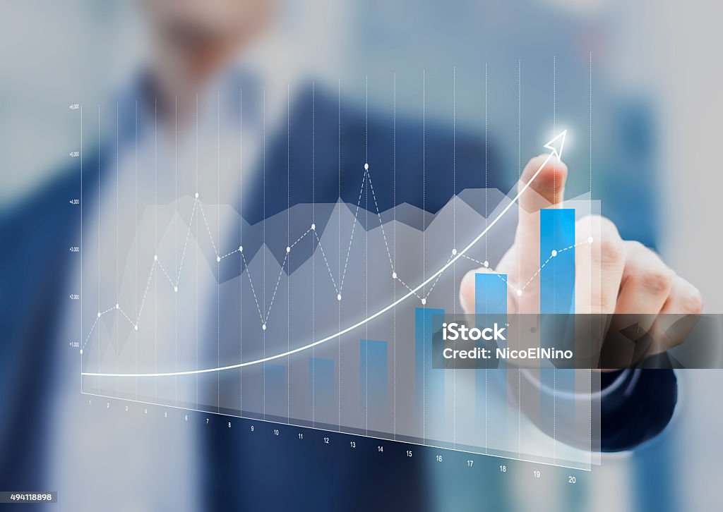 Financial charts mostrar crecimiento de los ingresos en pantalla táctil - Foto de stock de Crecimiento libre de derechos