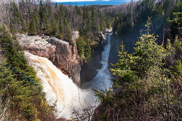 waterfalls and boreal forest stock photo