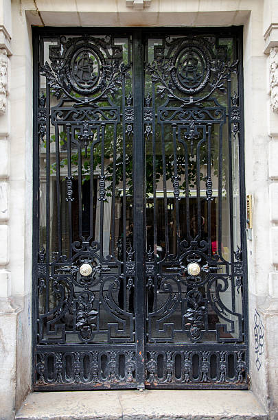 istock Beautiful, strong and old metallic door in Paris 494119422