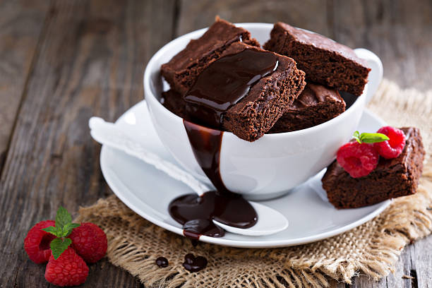 istock Brownies in stacked coffee cups with chocolate sauce 494120276