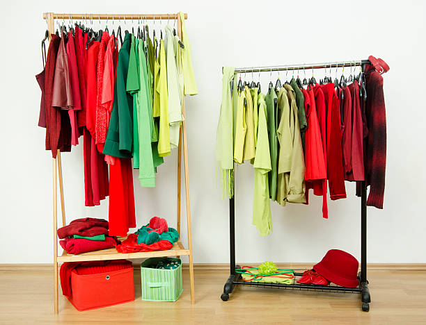 istock Wardrobe with complementary colors red and green clothes. 494120863