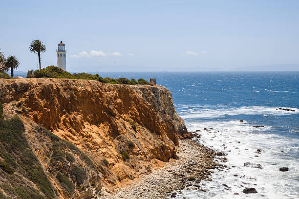 Point Vicente Lighthouse On a Clear Day, Palos Verdes California The Point Vicente Lighthouse in Palos Verdes California.  Rugged but beautiful red tinted cliffs worn away by the Pacific Ocean on a beautiful clear day. rancho palos verdes stock pictures, royalty-free photos & images