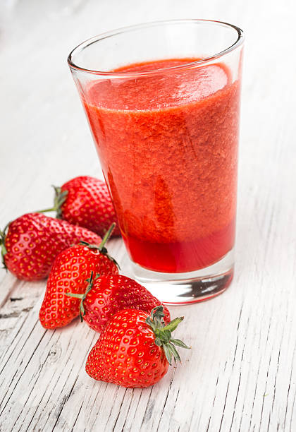 istock Fresh strawberry and juice in glass 494121760