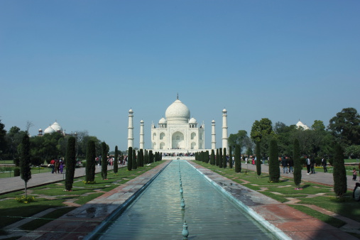 Agra, India - February 20, 2013: Tourists visiting Taj Mahal, a UNESCO world heritage site in Agra, India.