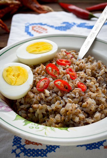 istock Buckwheat porridge with boiled egg and chili pepper 494122922