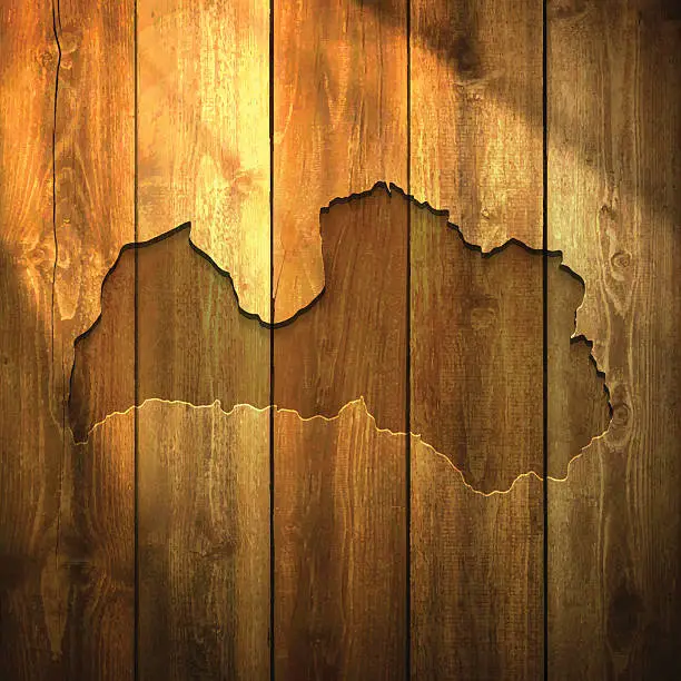 Vector illustration of Latvia Map on lit Wooden Background