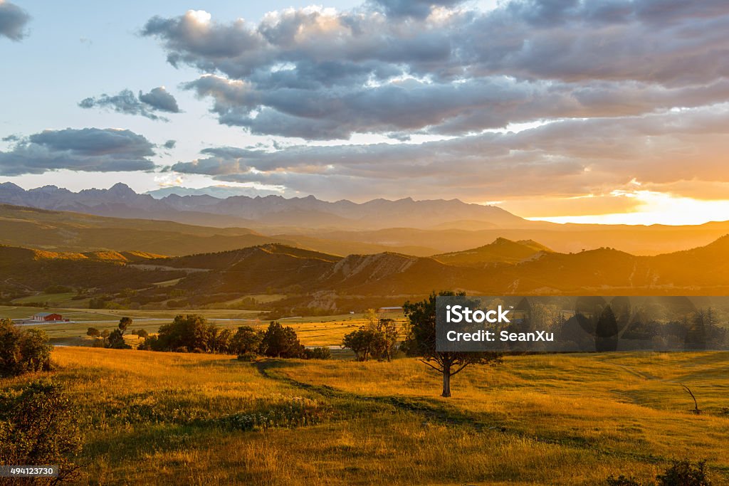 Sunset San Juans Autumn sunset scene of a mountain valley at foot of the rugged Sneffels Range, part of San Juan Mountains, in Colorado Rockies. Colorado Stock Photo