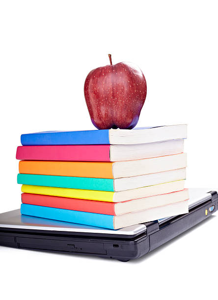 istock laptop computer books apple fruit food education school 494123987