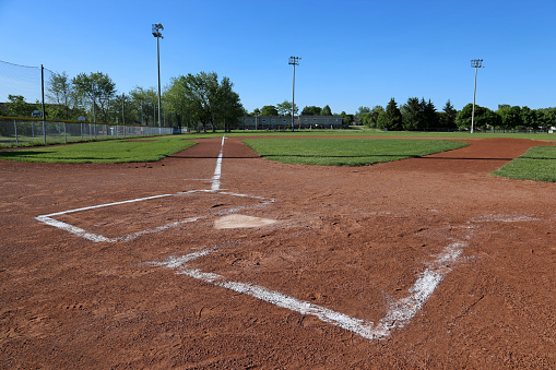 A low angle shot of a baseball field.