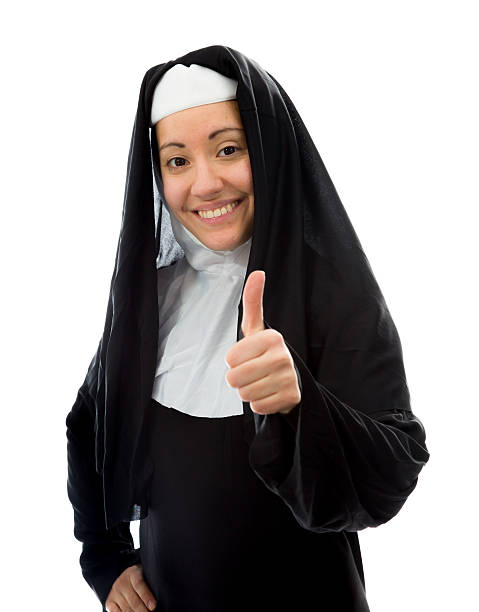 istock Young nun showing thumbs up sign and smiling 494124541