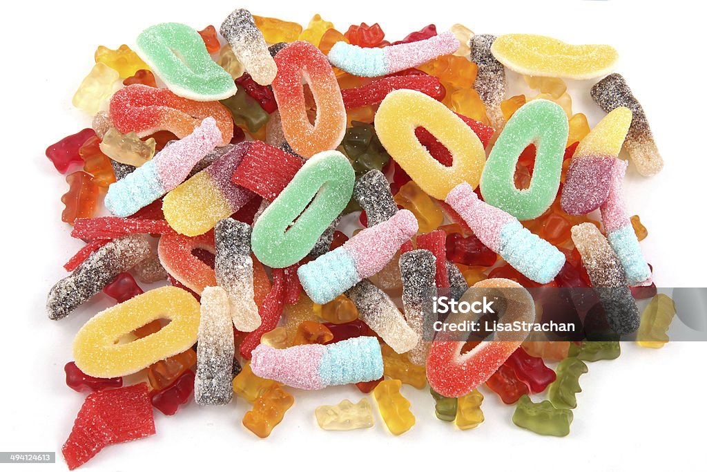 Candies in a variety of multi colors and shapes. Kids gummy candies or sweeties in multi colors and a variety of shapes. Bubble Gum Stock Photo