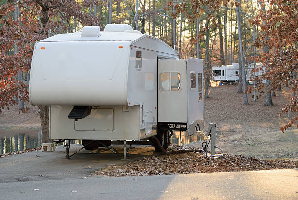 istock Fifth wheel camper in campground 494124884