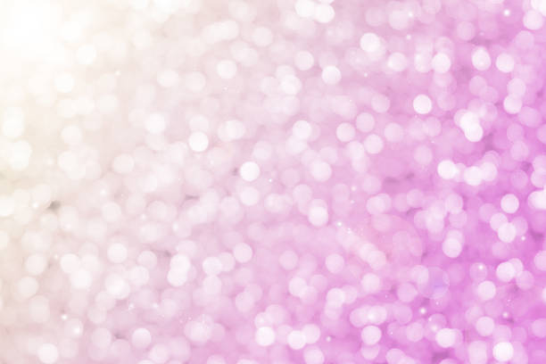 istock Pink glitter sparkle defocused rays lights bokeh 494127954