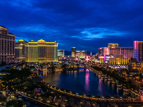 Las Vegas, United States - May 11, 2015: Las Vegas Strip at Sunset. Photo taken from balcony of the Cosmopolitan hotel and features several hotel properties on the strip and people on the streets enjoying Las Vegas.