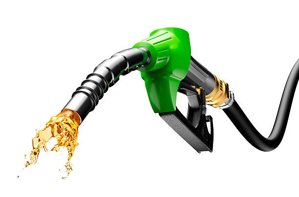 Gasoline Gushing Out From Pump Gasoline gushing out from pump isolated on white background biofuel stock pictures, royalty-free photos & images