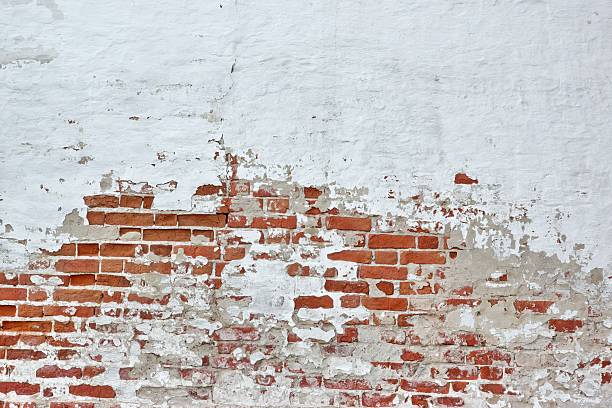 istock Old Vinyage Red Brick Wall With Sprinkled White Plaster Texture 494131060