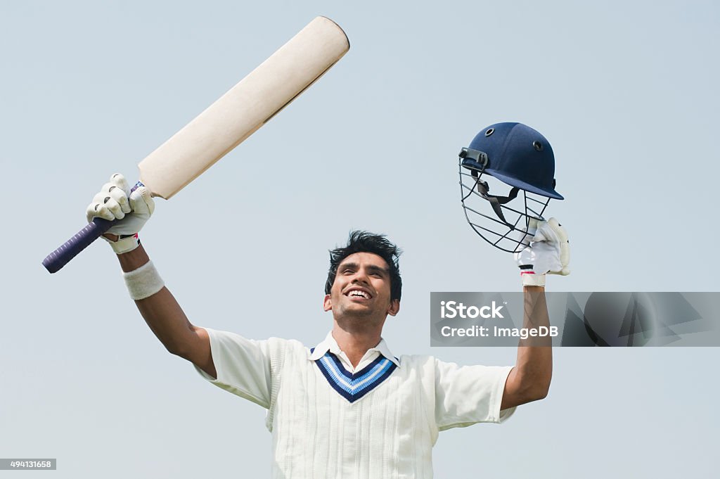Cricket batsman celebrating his success Sport of Cricket Stock Photo