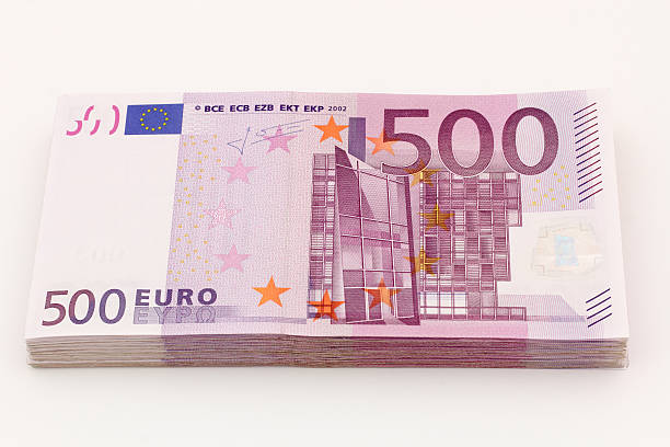 istock Isolated stack of 500 euro bills banknotes with white background 494133718