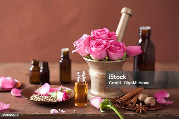 Spa And Aromatherapy Set With Rose Flowers Mortar And Spices Stock Photo - Download Image Now