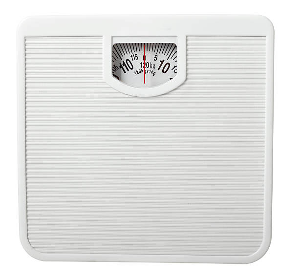 istock scale libra measurement tape diet fruit food apple 494146193