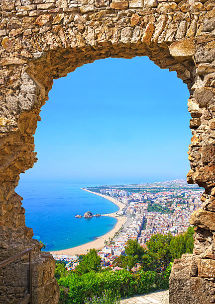 istock View of Spanish beach through a stone door, Costa Brava 494147969