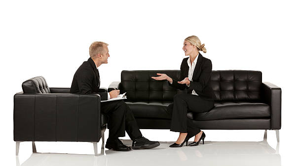 istock Business executives sitting on couch and discussing 494148869