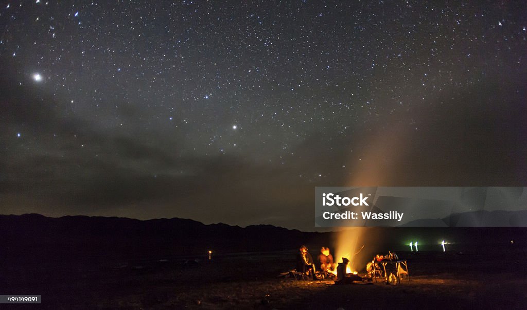 night camping under the stars Mountains Campfire Stock Photo