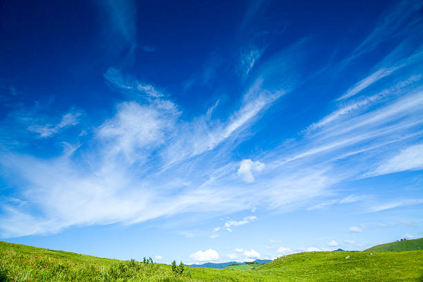 Green hill and cloud grassy plain hill and cirrus cloud plateau stock pictures, royalty-free photos & images