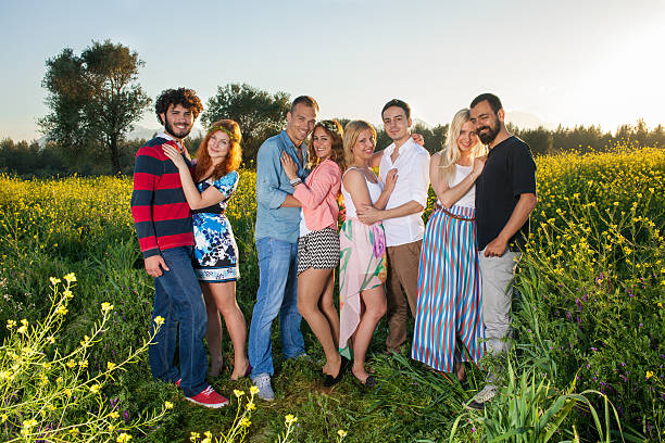 istock Four young couples in the country at sunset. 494150909