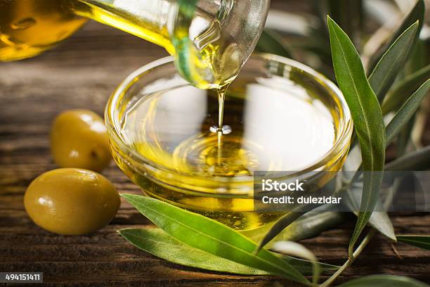 Olive Oil Stock Photo - Download Image Now - Olive Oil, Extra Virgin Olive Oil, Pouring