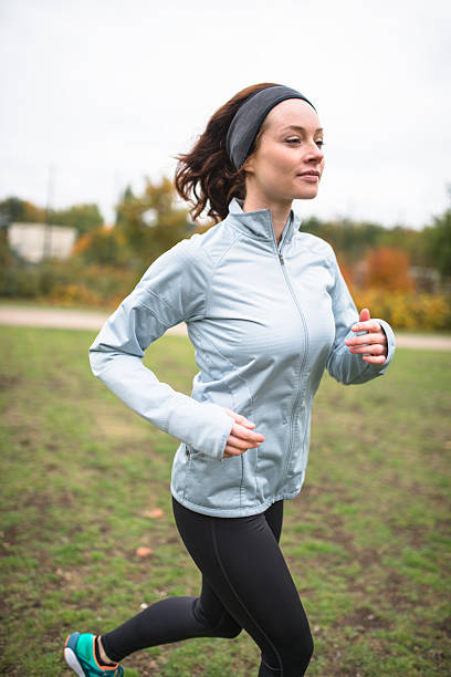 istock Running woman in the park 494152040