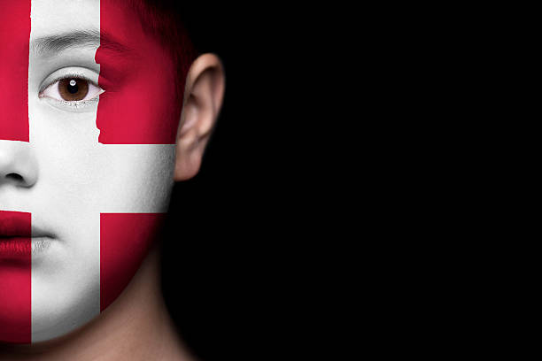 istock Human face painted with flag of Denmark 494152051
