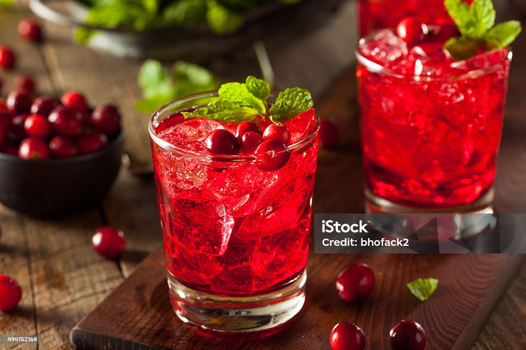 Homemade Boozy Cranberry Cocktail Homemade Boozy Cranberry Cocktail with Vodka and Mint Cranberry Juice Stock Photo