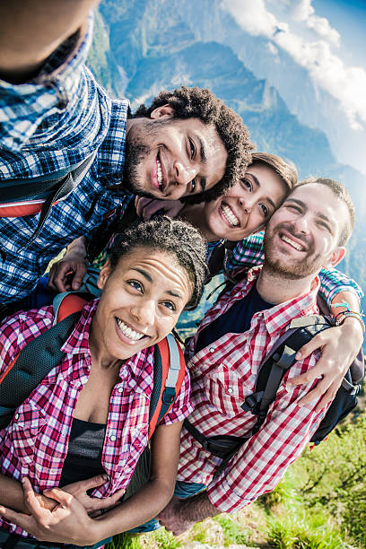 istock Group of friend taking selfie in mountain 494152801