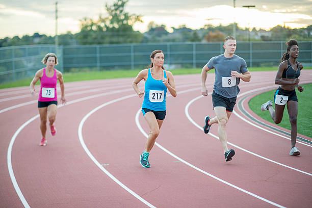 istock Adults Racing Sprints at the Track 494153870