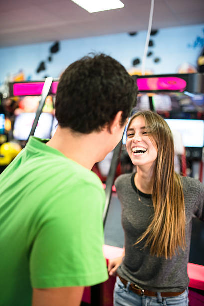 istock Friends have fun on the game room 494154592