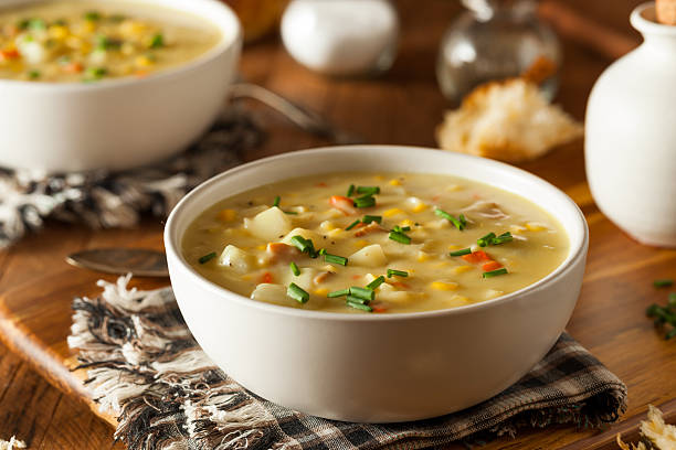 Hot Homemade Corn Chowder Hot Homemade Corn Chowder in a Bowl soup stock pictures, royalty-free photos & images