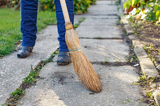 istock Woman sweeps at autumn 494154944