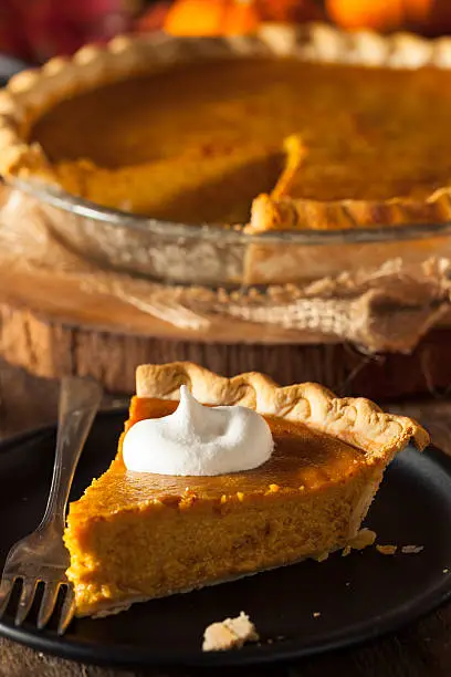 Festive Homemade Pumpkin Pie with Whipped Cream