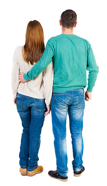 istock Back view of young embracing couple 494156054