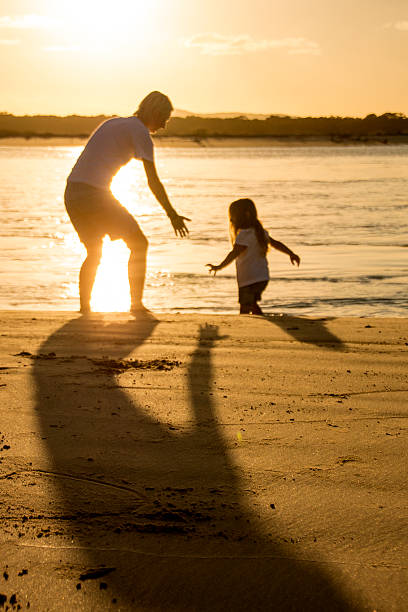 istock Mother reaching out to hold daughter's hand 494157866