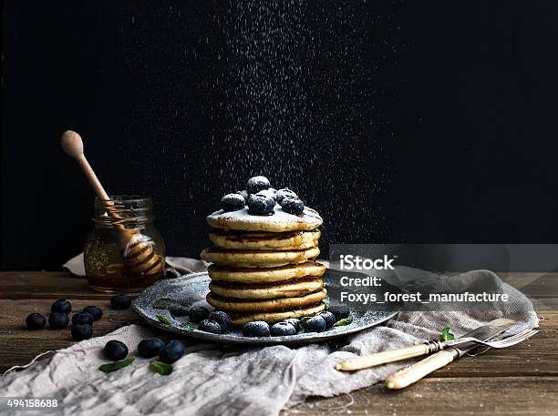 Pancake Tower With Fresh Blueberry And Mint On A Rustic Stock Photo - Download Image Now